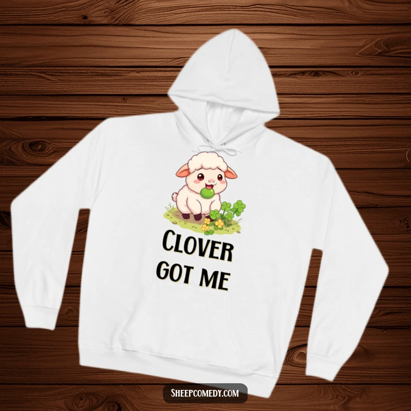 Funny sheep hoodie featuring a happy sheep munching on a hidden clover patch, cozy and contentment-inducing design.