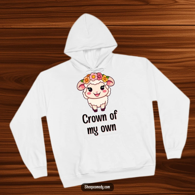 Funny Flower Crown Sheep Hoodie: A smiling sheep character wearing a colorful flower crown, warm and humorous.