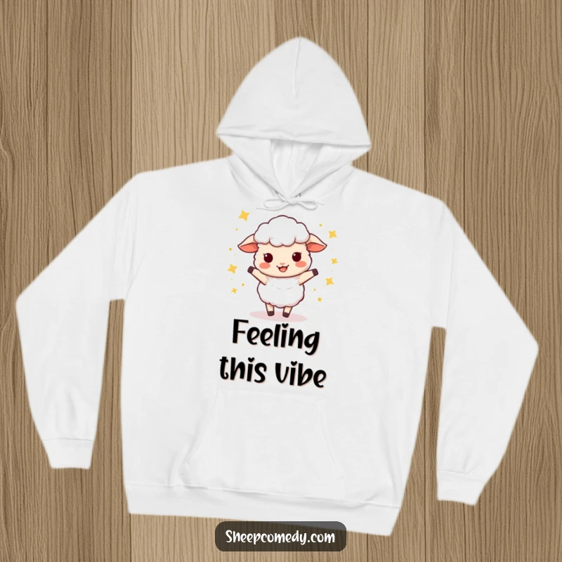 Funny Sheep Hoodie: A soft hoodie depicting a sheep joyfully wiggle dancing surrounded by a magical cluster of stars.