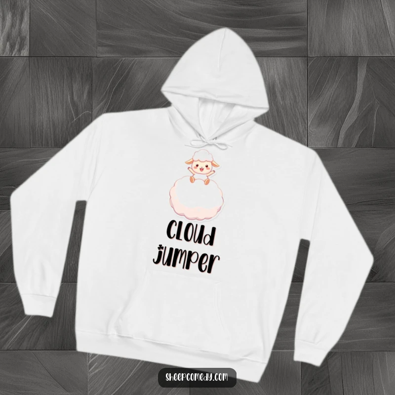 Funny sheep hoodie: a happy sheep character has a delightful bounce on an enormous, fluffy marshmallow, radiating warmth and amusement.