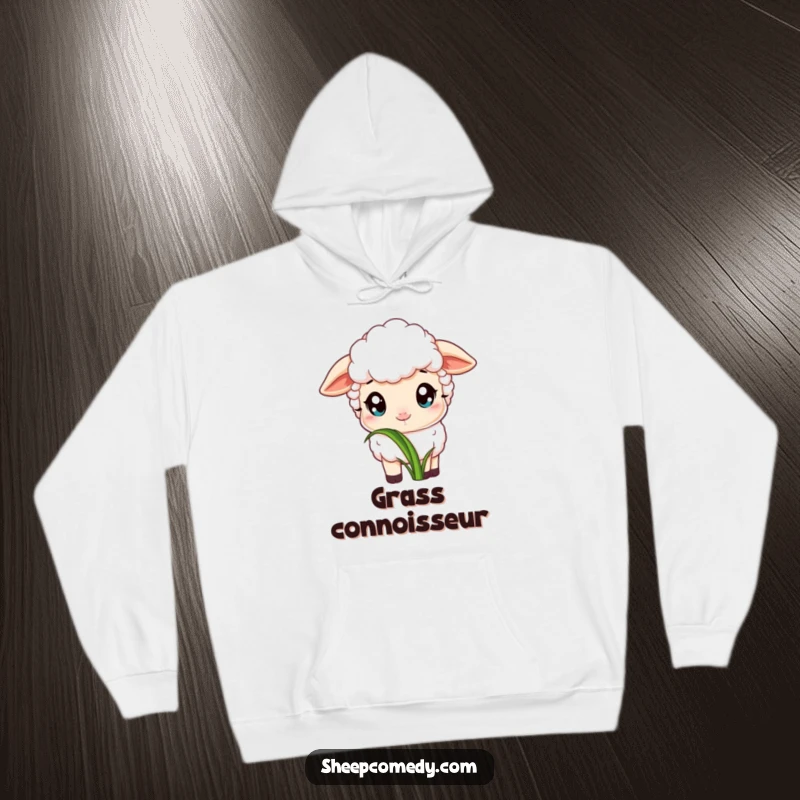 Funny hoodie depicting a sheep with wide, innocent eyes, peacefully nibbling on a single, very tempting blade of grass, exuding calm.