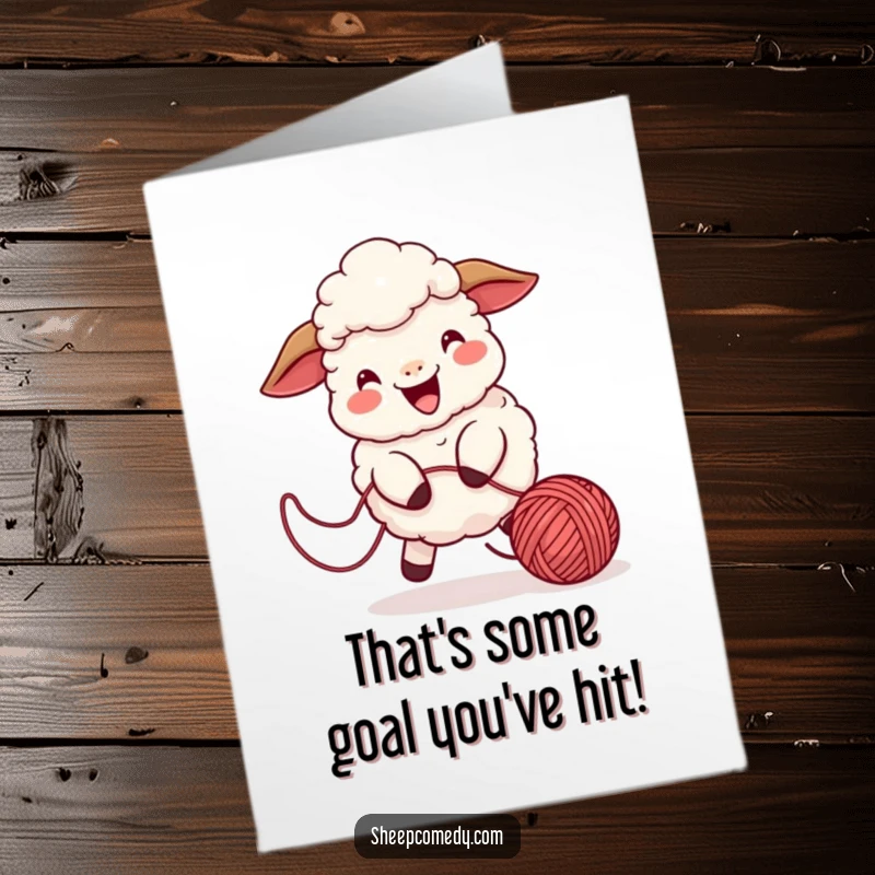 Funny Free Printable Congratulations Card: A playful sheep happily chasing a bouncing ball of yarn, celebrating a great success.