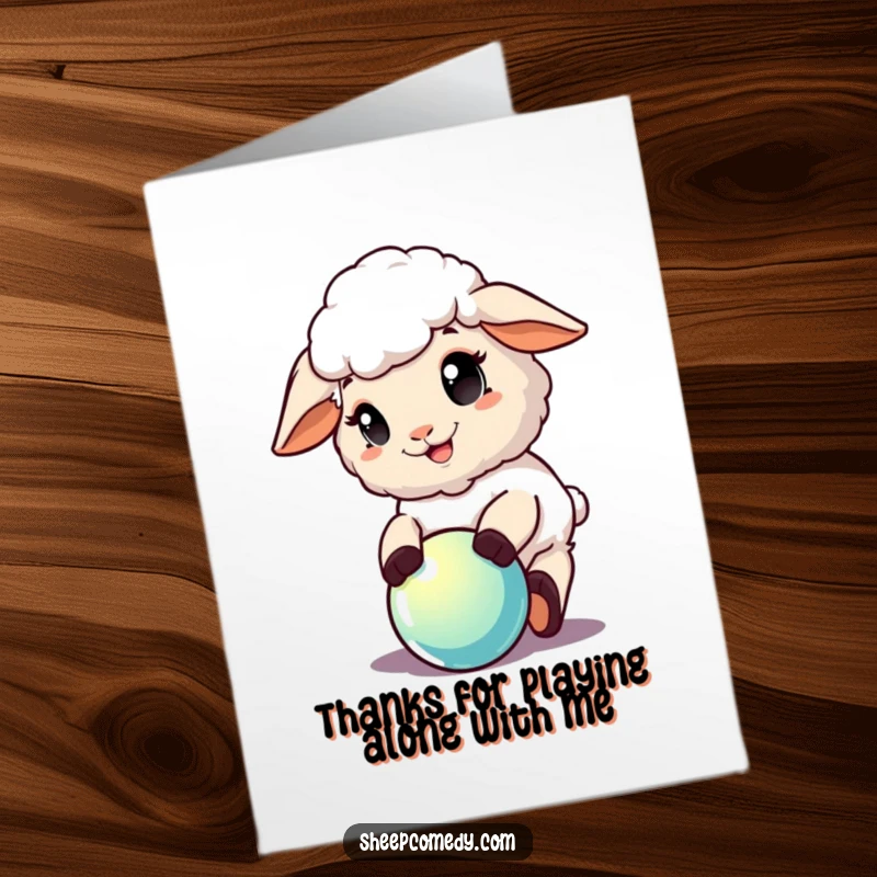 Funny Free Printable Thank You Card: A sheep happily plays with a shiny ball, sending thanks with glee.