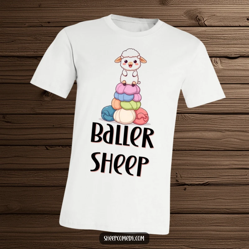 Funny t-shirt with a delighted sheep character balancing a colorful, giant stack of wool balls, looking focused and proud.