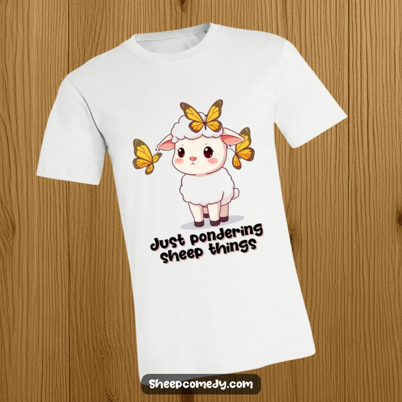 Funny sheep t-shirt, captivated by a colorful butterfly, showing curious wonder, a perfect funny gift.