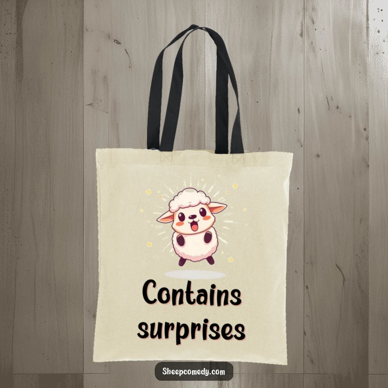 Funny tote bag with a surprised sheep character recoiling from an exploding, sparkling pom-pom, perfect for carrying items with a humorous surprise.